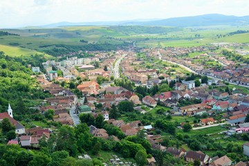 Fototapeta na wymiar Panorama Rupea city in Transylvania, Romania . View from Rupea fortress.