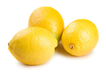 Three lemons isolated on white background