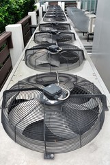 Row of Residential air conditioner compressor units in The Garden