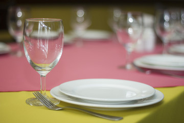 Empty glasses and plate in restaurant