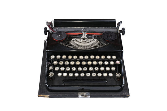 Old Typewriter Machine Isolated On A White Background