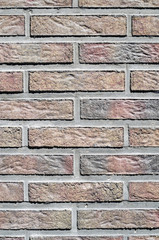Colorful concrete blocks imitating bricks on wall