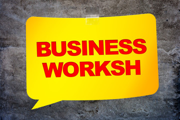 "Business worksh" in the yellow banner textural background. Desi