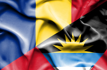 Waving flag of Antigua and Barbuda and Romania