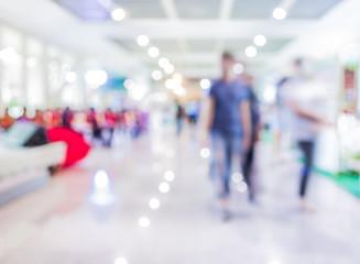 Blurred image of people walking at day market , blur background