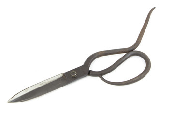 vintage old scissors of tailoring isolated on white