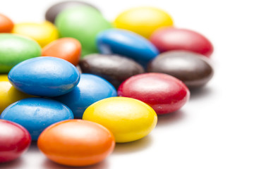 Plenty of Colorful Chocolate Buttons of Left