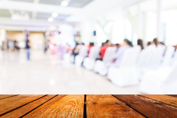 Blurred image of people in auditorium , blur background with bok