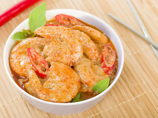 Thai Prawn Curry - King prawns in red curry sauce and coconut milk in a lilac bowl.