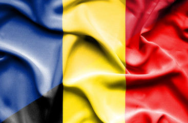 Waving flag of Belgium and Romania