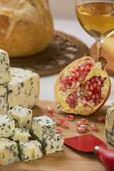 Different cheeses on a cutting board, delicious food