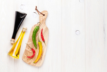 Colorful chili peppers and condiments