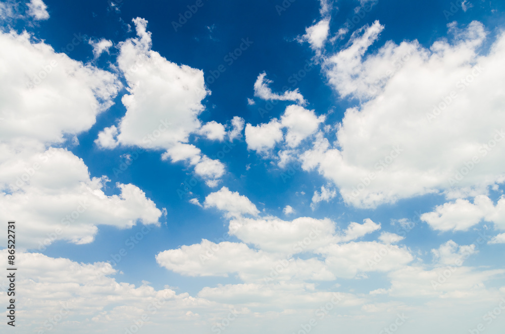 Wall mural blue sky with clouds closeup