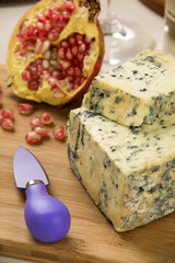 Different cheeses on a cutting board, delicious food