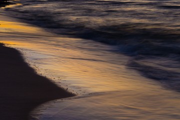 Beautiful Baltic sea beach at sunset