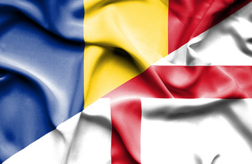 Waving flag of England and Romania