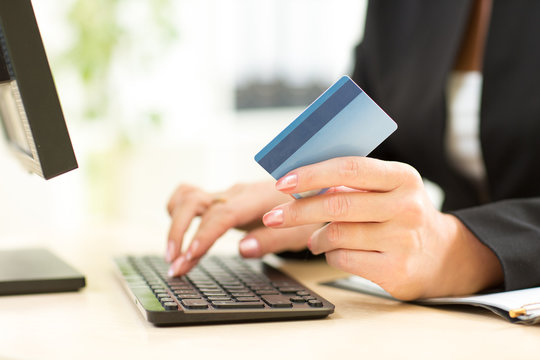 Business Woman holding Credit Card for Online Payment