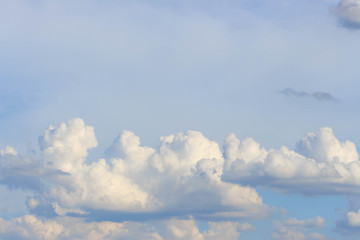 Fototapeta na wymiar blue sky with clouds blurred background