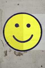 Happy Smiley Painted On The Old Cracked Concrete Wall