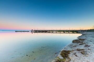 Fototapeta premium Beautiful wooden pier on Baltic sea shore