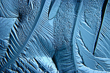 abstract blue background cold ice texture with cracks