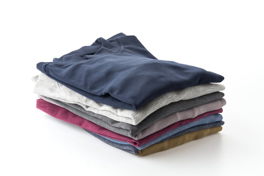 Stack of clothes isolated on white background