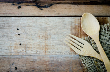 Spoon and fork on wood table
