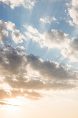 Clouds and sunrays at sunrise