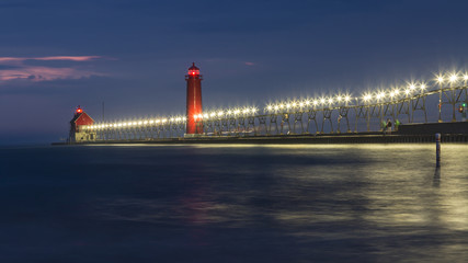 A night view of lit up lighthouse in Grand Haven, Michigan