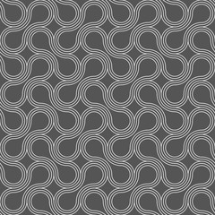 Dark gray ornament with offset rounded shapes