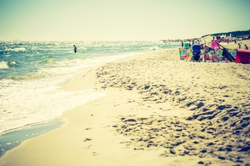 Vintage photo of beach with people