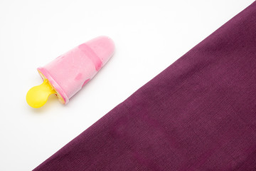 ice cream pop on white and purple background