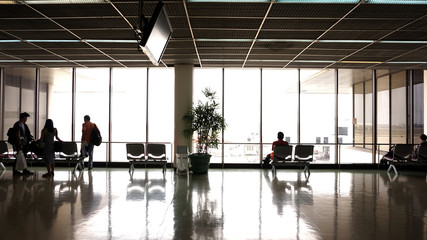 people silhouette at airport