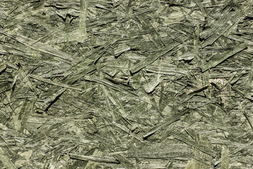 Green chipboard texture.