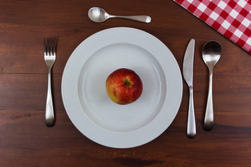 apple on a white plate
