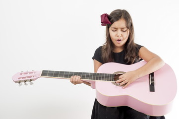 Girl playing guitar and sing