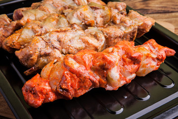 Raw beef skewers ready for grilling