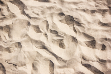 Beach wavy sand texture.
