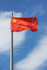 China flag on the blue sky