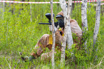 Paintball ambush in birch trees