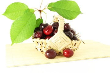 cherry with leaves in pure white background