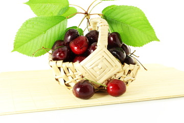 cherry with leaves in pure white background