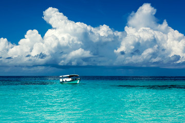Boat in the lagoon of paradise in the Caribbean
