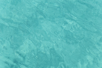 Shining turquoise water ripple background