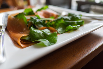 Smoked salmon salad with rocket