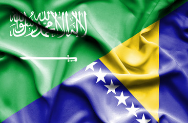 Waving flag of Bosnia and Herzegovina and Saudi Arabia