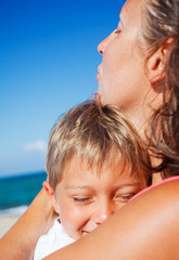 Mother and her son at beach