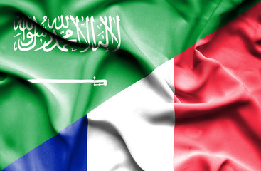 Waving flag of France and Saudi Arabia