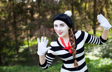 Emotional Mime on the park background