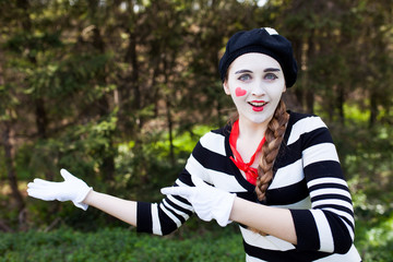Emotional Mime on the park background